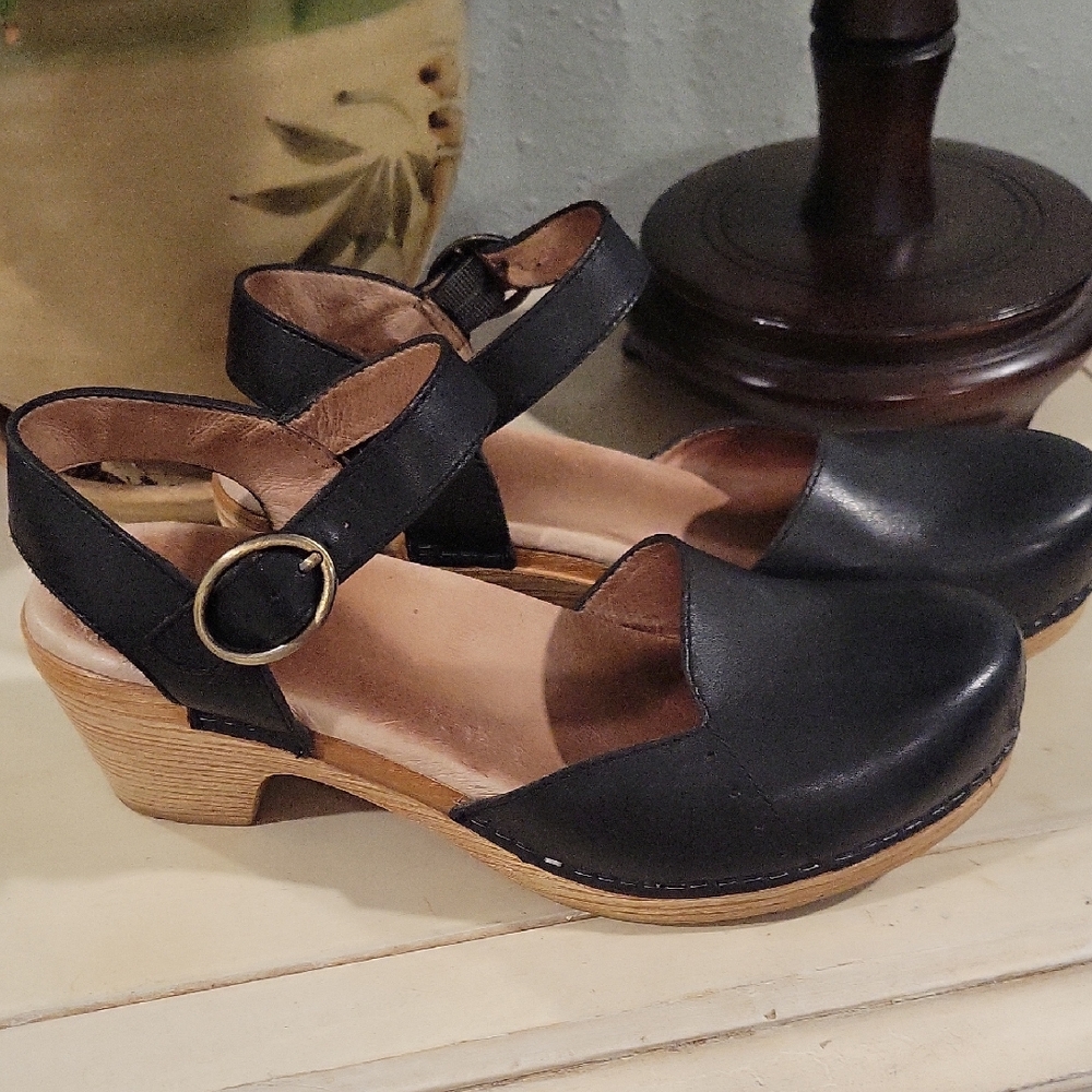 Dansko Black Leather Mules with Tan Sole